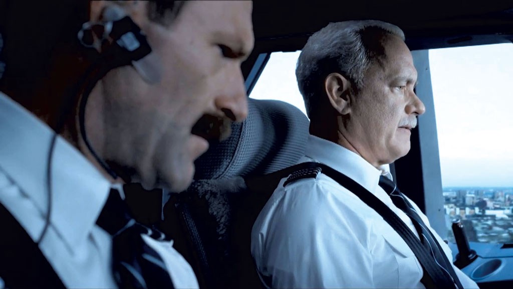 FLIGHT CONTROL Eckhart and Hanks star in a gripping and impressively conceived celebration of regular guys who are very good at their jobs.