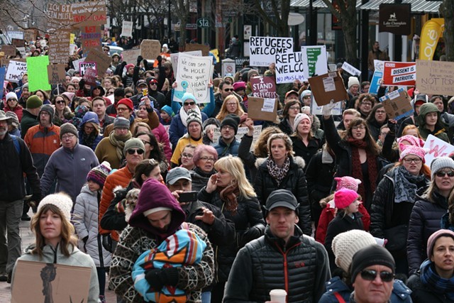 Marchers in Burlington during a pro-refugee rally - JOHN JAMES