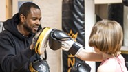 Boxing Coach "King" James McMillan Teaches Students How to Roll With the Punches