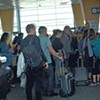 Passengers waiting to board a flight at Burlington International Airport