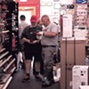 Bob Nelson (left) helping a customer