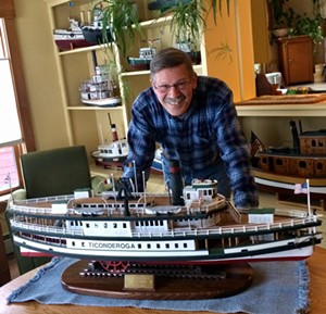COURTESY OF THE HENRY SHELDON MUSEUM - Jerry DeGraff with a model of the 'Ticonderoga'